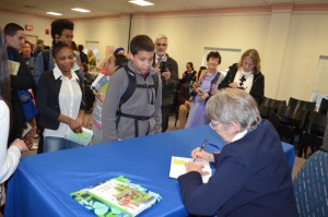 Lois Lowry graciously signs books for her many fans prior to her talk.